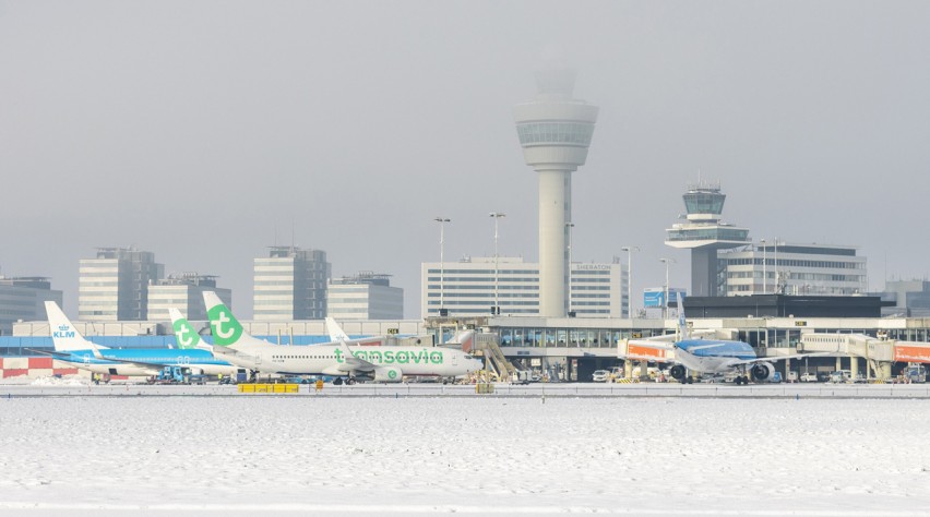 Schiphol in de sneeuw